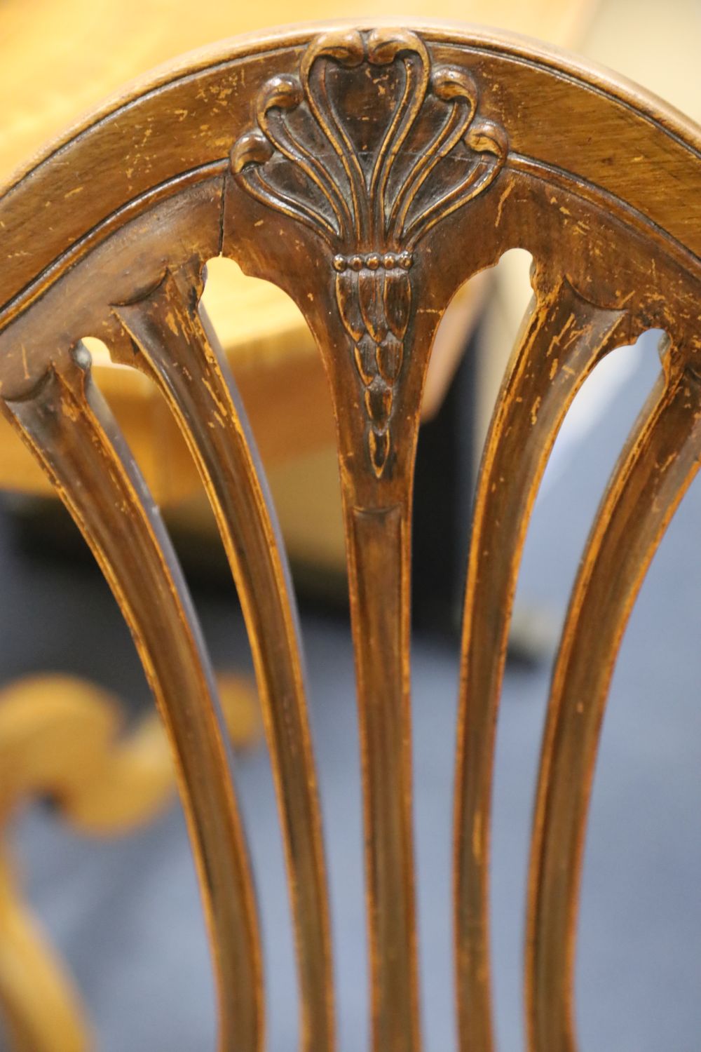 A pair of Hepplewhite style mahogany open armchairs